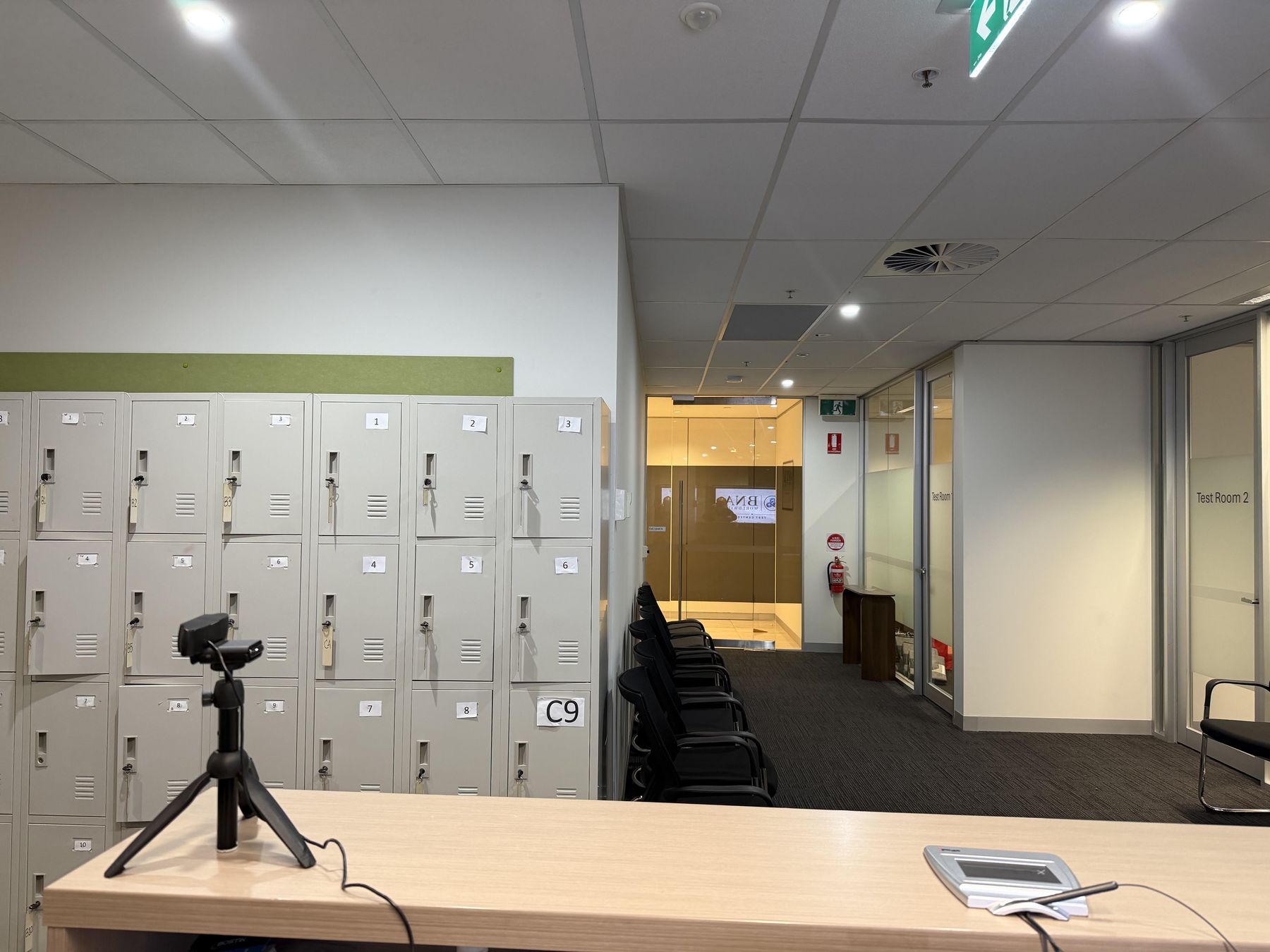 Secure lockers for candidate belongings